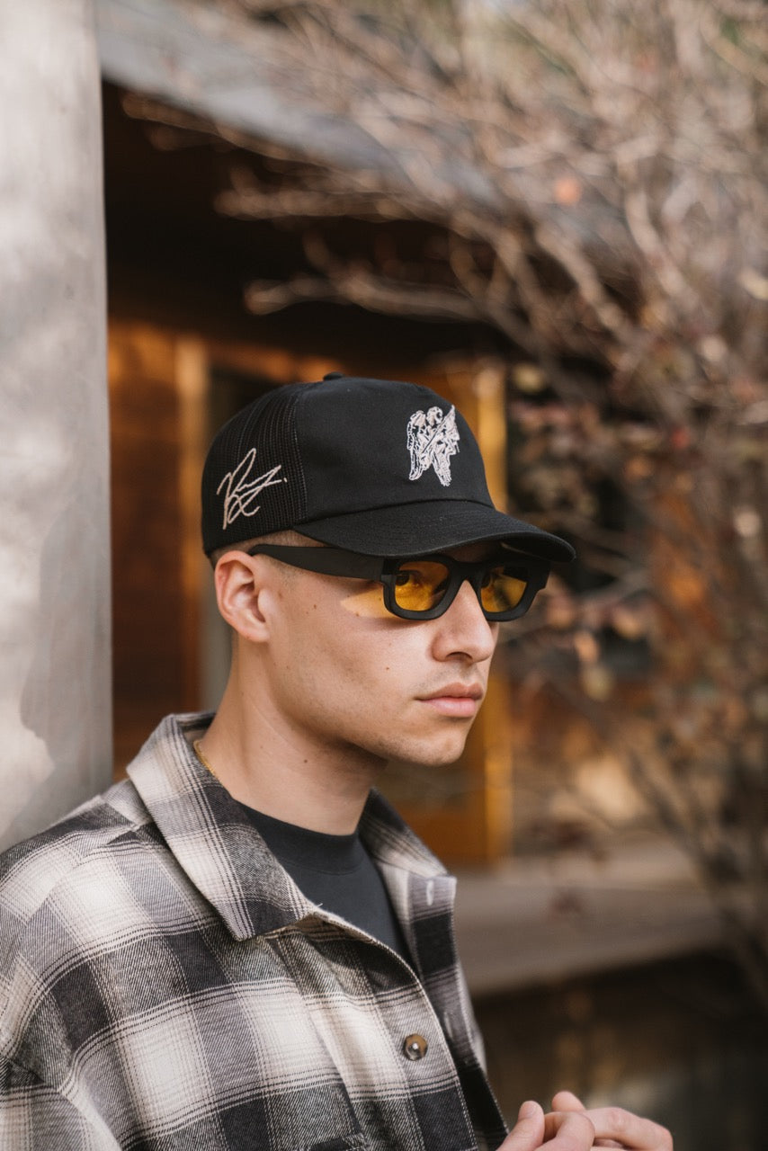 UNSTRUCTURED ANGEL TRUCKER HAT - BLACK